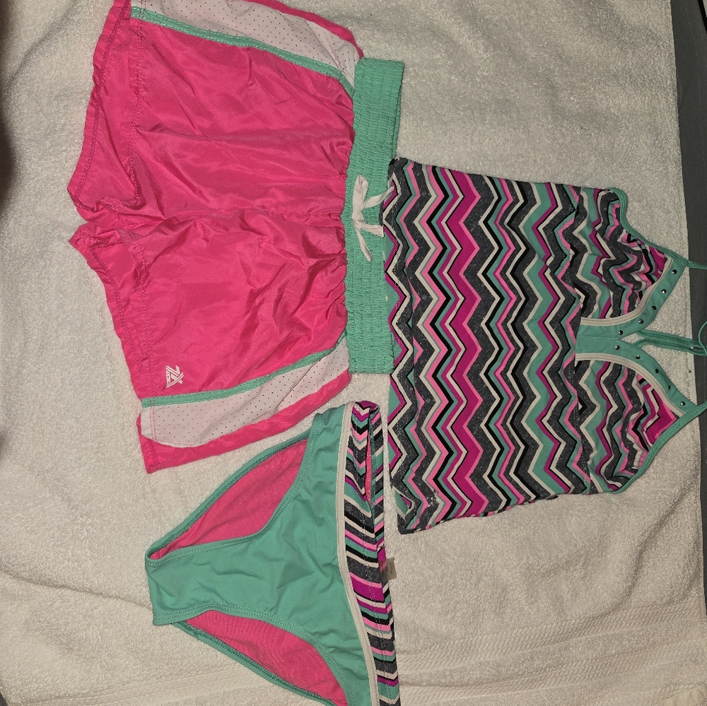 3 piece swimsuit set.  Shorts and tank top with bottoms.